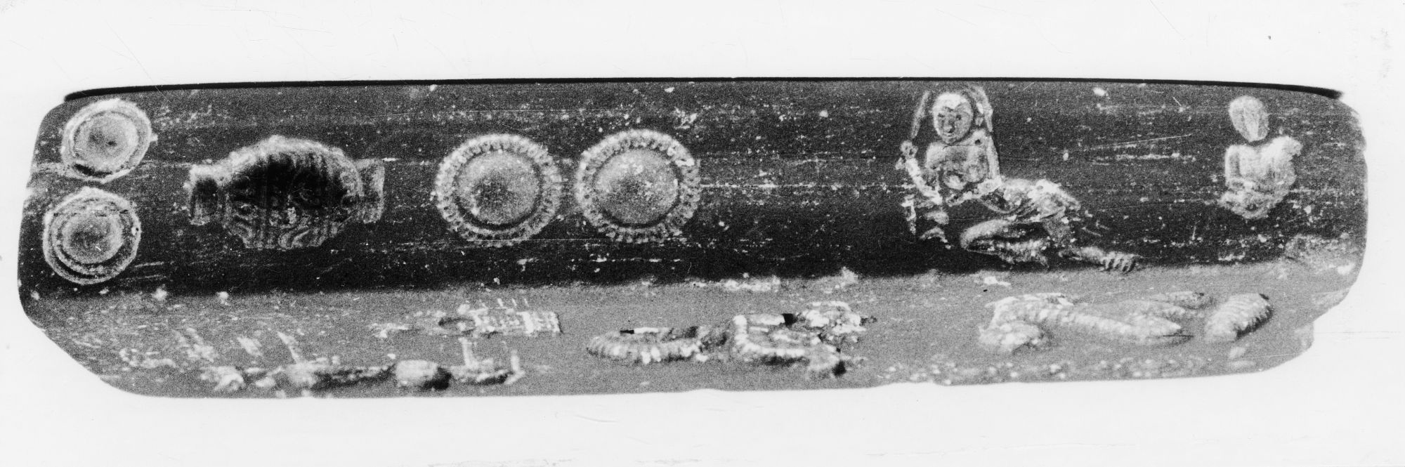 Carved rectangular mold, Paithan, Maharashtra, India, ca. 1st-3rd century, Haematite, H. 13.5 x L. 4.0 x B. 2.3 cm., #100016.