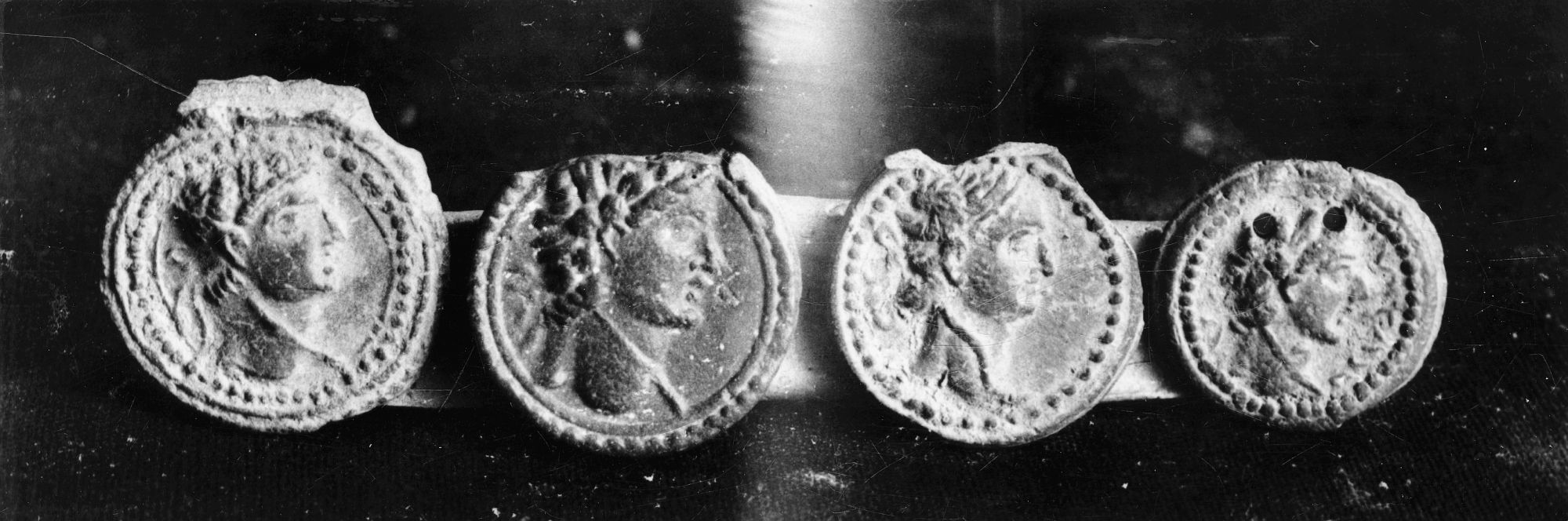 Four Bullae, Ter, Maharashtra, India, ca. 1st-3rd century BCE, Terracotta, D. 1.8, 1.5, 2.0, 1.9 cm., #103813.