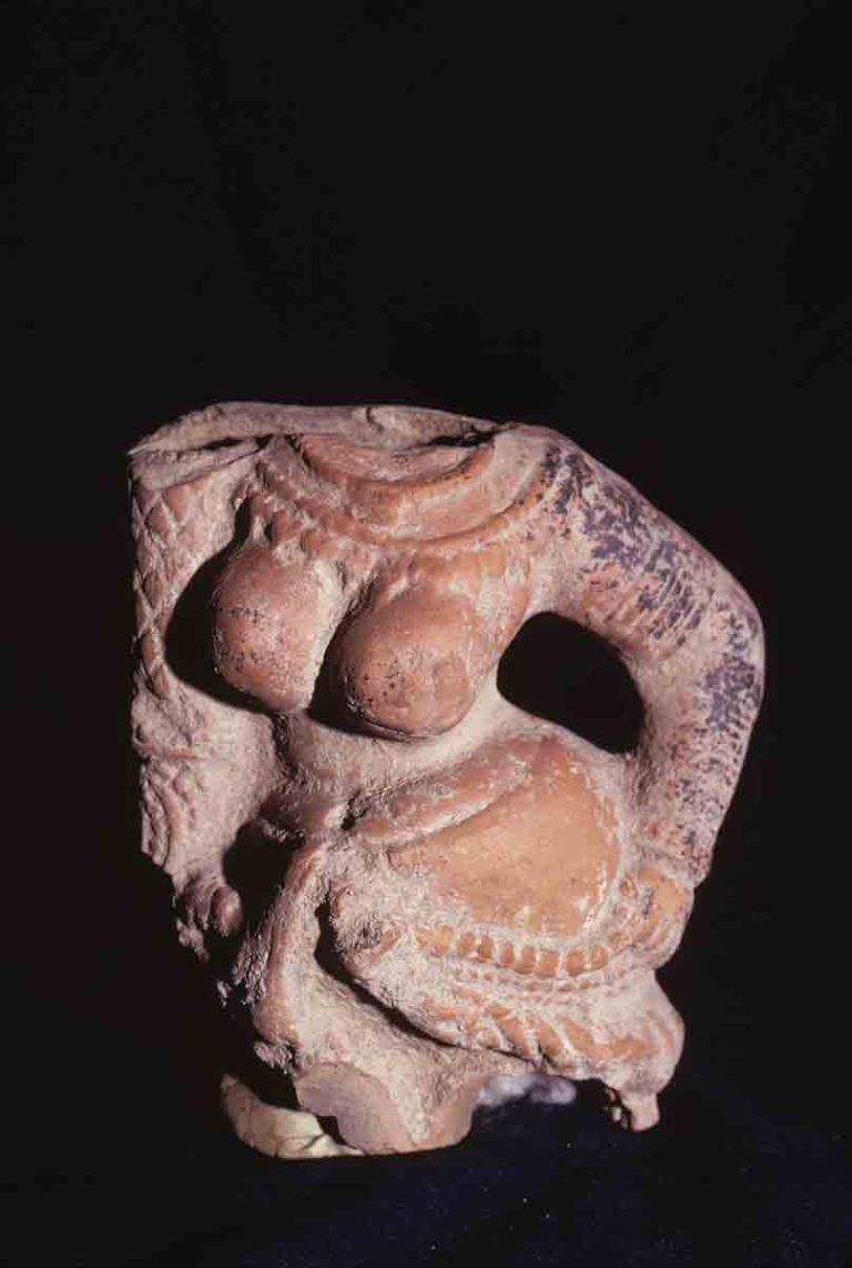 Front. Torso of a female figurine standing in tribhanga,
Ter, Osmanabad Maharashtra, India, ca. 100-299 CE, Red Baked Terracotta, double mold, Height: 10.07 cm,
#11228.