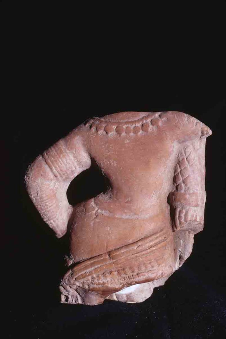 Back. Torso of a female figurine standing in tribhanga, Ter, Osmanabad Maharashtra, India, ca. 100-299 CE, Red Baked Terracotta, double mold, Height: 10.07 cm, #11229.