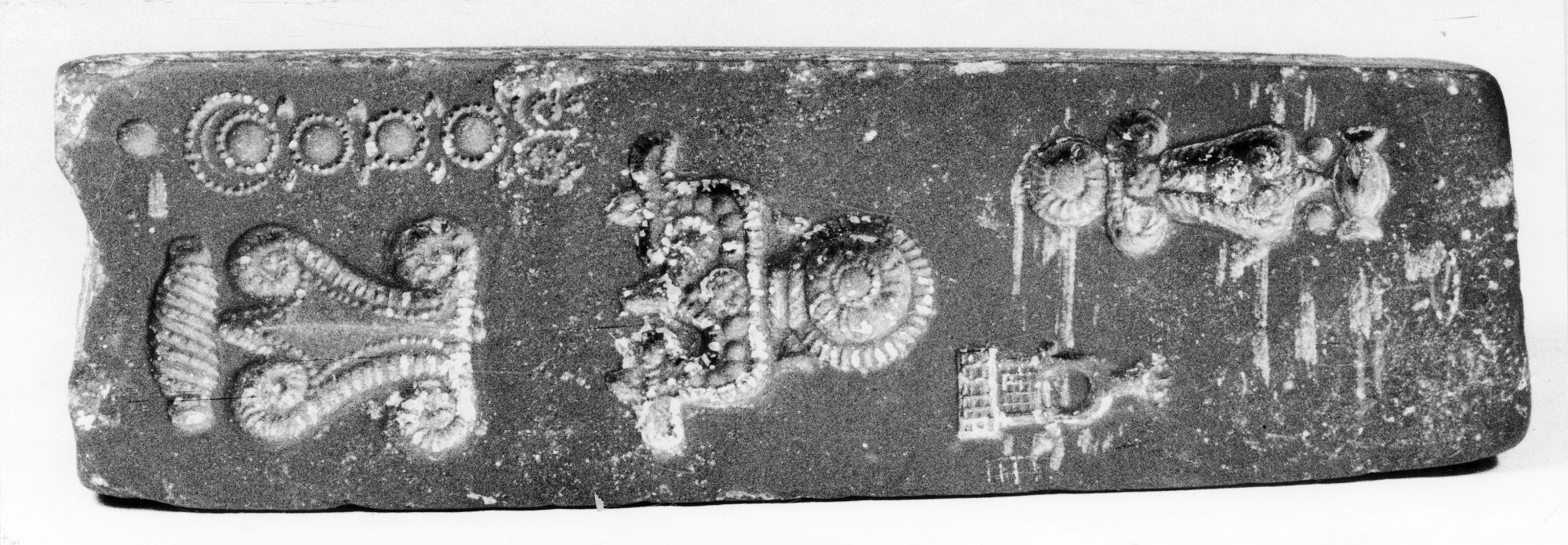 Carved rectangular mold, Paithan, Maharashtra, India, ca. 1st-3rd century, Haematite, H. 13.5 x L. 4.0 x B. 2.3 cm., #100021.
