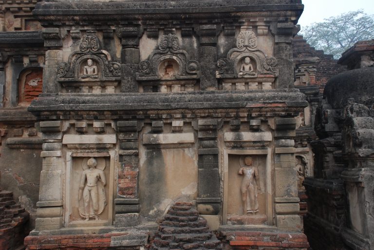 Stucco sculptures on the corner wall of the temple of Site 3 also known as the Great Monument.