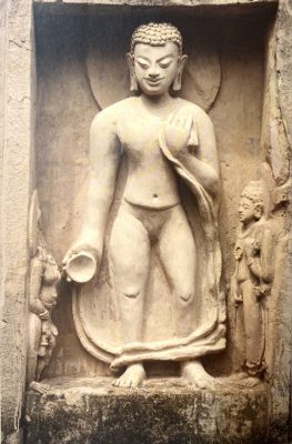 Stucco image of the Buddha holding a begging bowl from the same grouping of stucco sculptures on the Great Monument of Site 3.