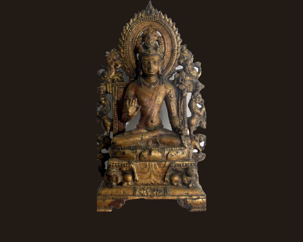 Seated bronze Buddha excavted from Site 8. Currently housed at Nalanda Museum, Accession no: 00156.